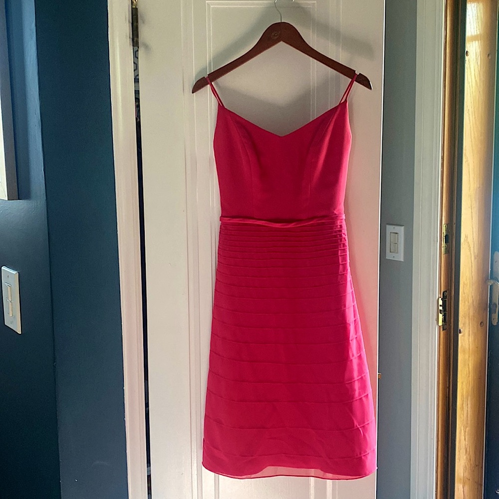 Pink chiffon, tea length bridesmaid dress.